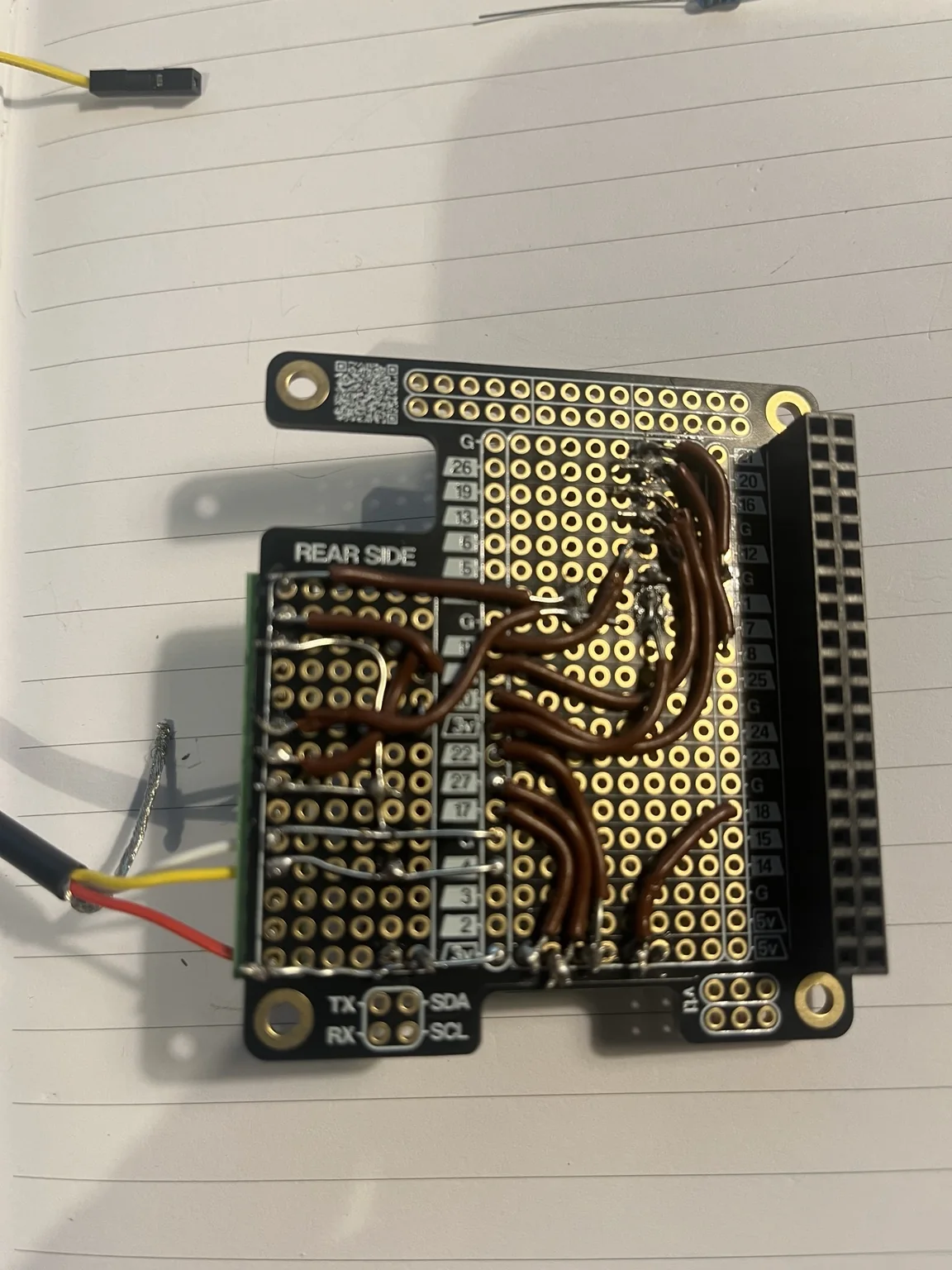 Hand-wired prototype board with soldered connections for the garden controller