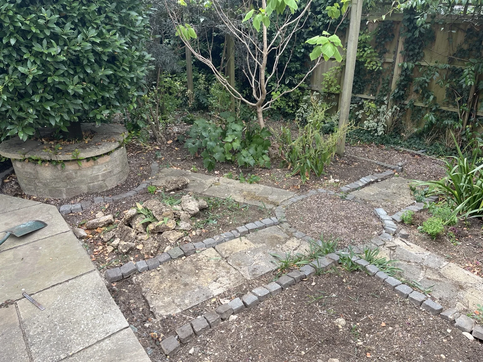 Real garden path and planting area during patio and edging work